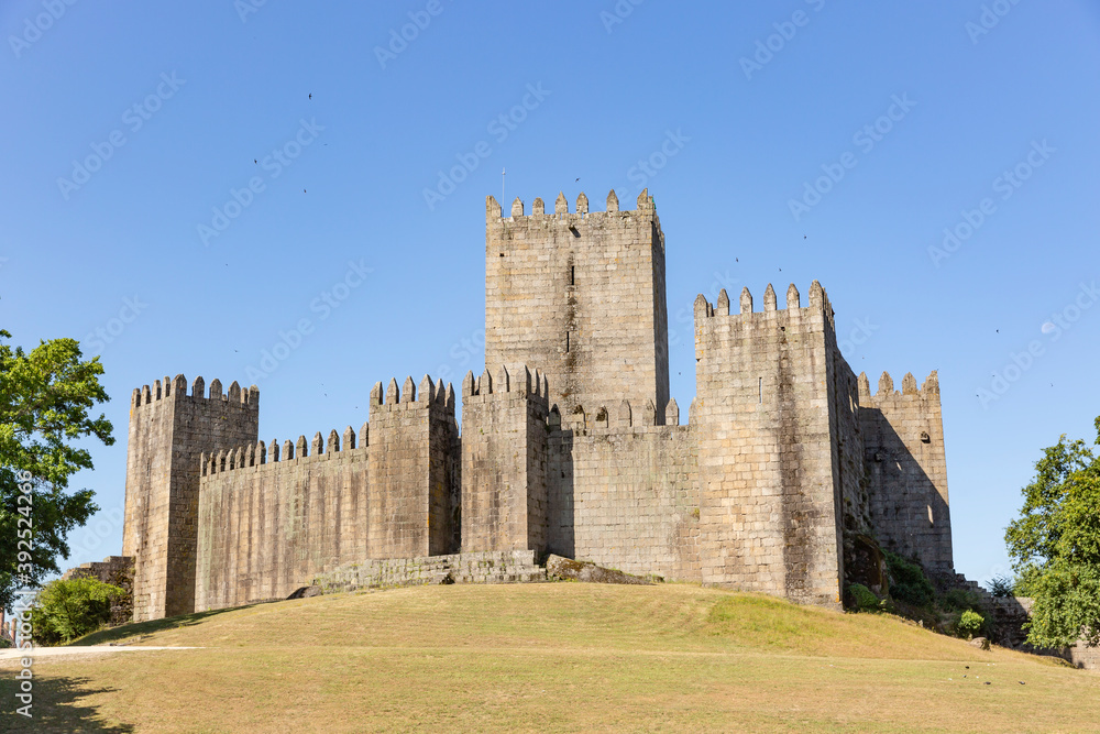 the medieval castle of Guimarães city, District of Braga, Portugal the medieval castle of Guimarães city, District of Braga, Portugal