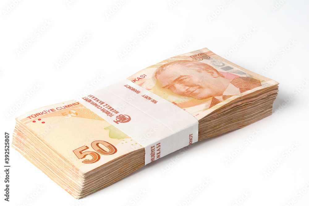 Stack of one hundred pieces fifty turkish lira bills isolated on white Stack of one hundred pieces fifty turkish lira bills isolated on white