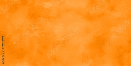 Wide Angle bright orange stucco background