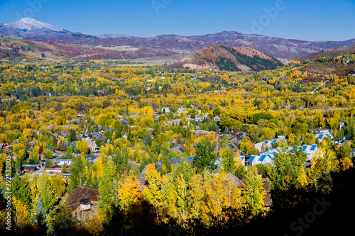 Aspen Colorado West End Aerial - Aspens just starting to turn in Aspen Colorado view down the Roaring Fork Valley looking northwest from Smugglers Mountain Road in Autumn, Pitkin County