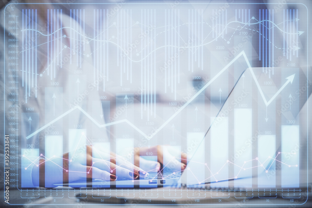 Double exposure of woman hands working on computer and forex graph hologram drawing. Financial analysis concept. Double exposure of woman hands working on computer and forex graph hologram drawing. Financial analysis concept.