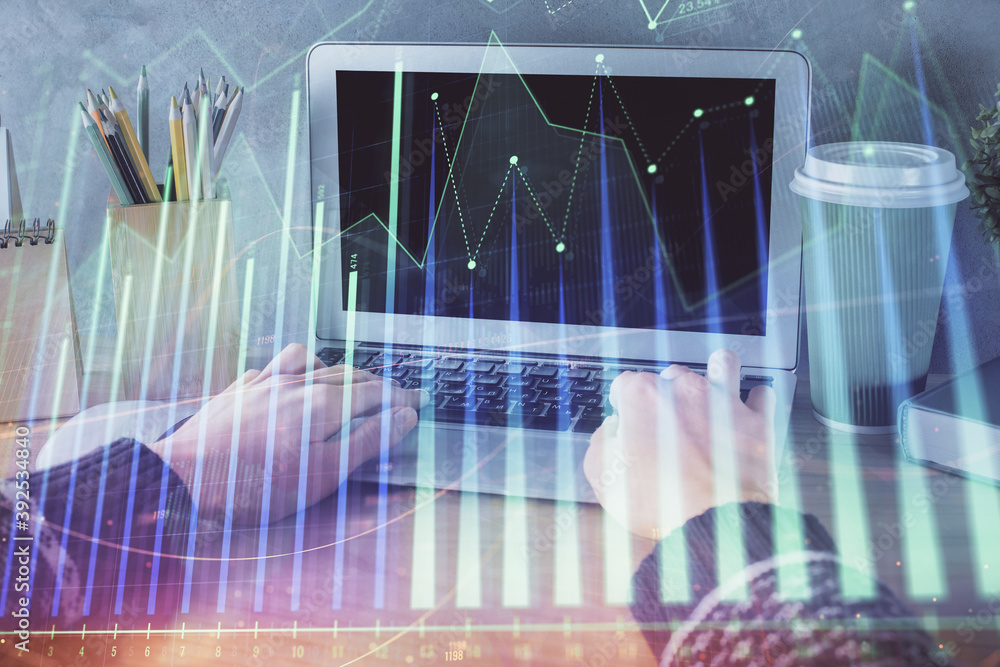 Double exposure of woman hands typing on computer and forex chart hologram drawing. Stock market invest concept. Double exposure of woman hands typing on computer and forex chart hologram drawing. Stock market invest concept.