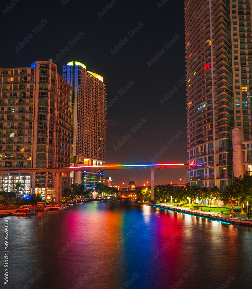 city skyline at night miami florida Brickell buildings reflections colors downtown  