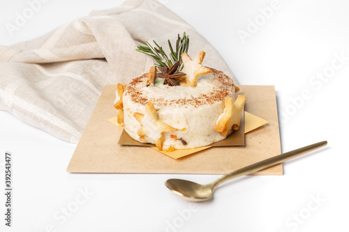 Dessert pastry on wooden plate with golden spoon 
