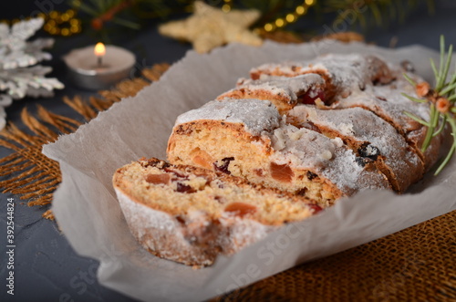 Christmas stollen on white parchment.
