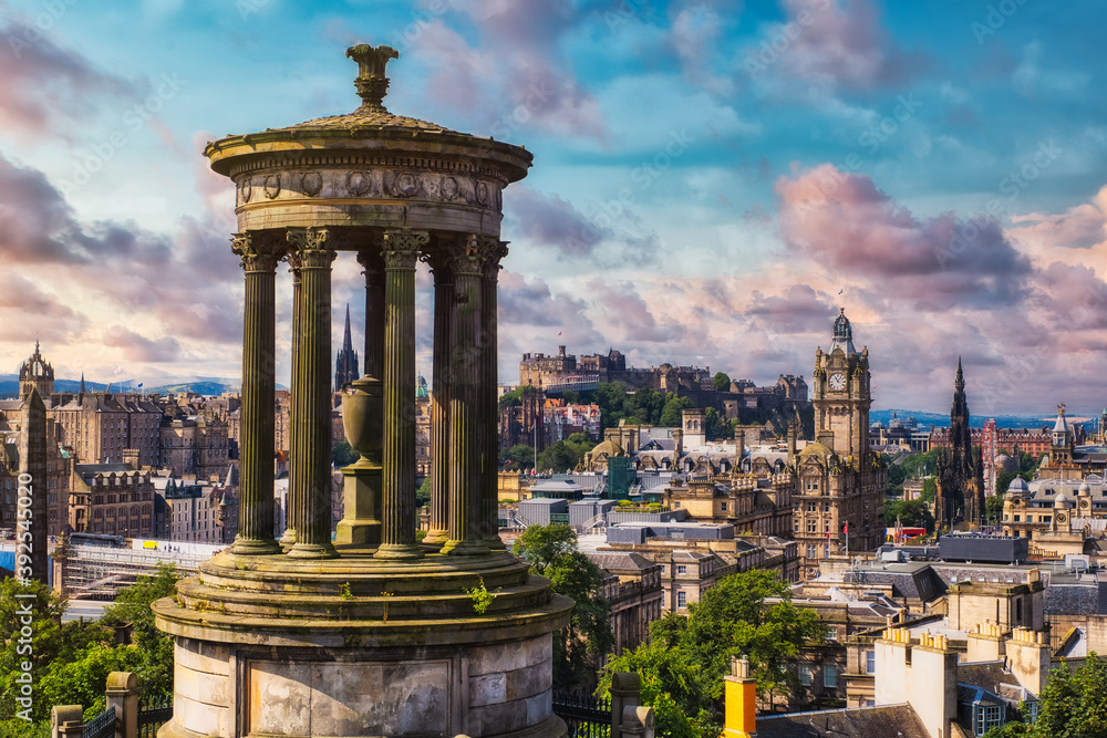 The city of Edinburgh in Scotland at sunset as seen from Calton Hill