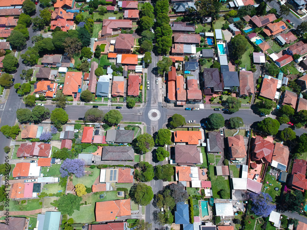 Panoramic Aerial Drone view of Suburban Sydney NSW Australia house, roof tops, the streets and trees Panoramic Aerial Drone view of Suburban Sydney NSW Australia house, roof tops, the streets and trees