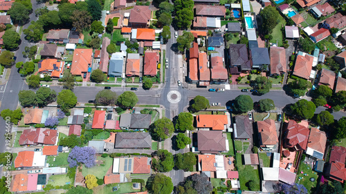 Panoramic Aerial Drone view of Suburban Sydney NSW Australia house, roof tops, the streets and trees