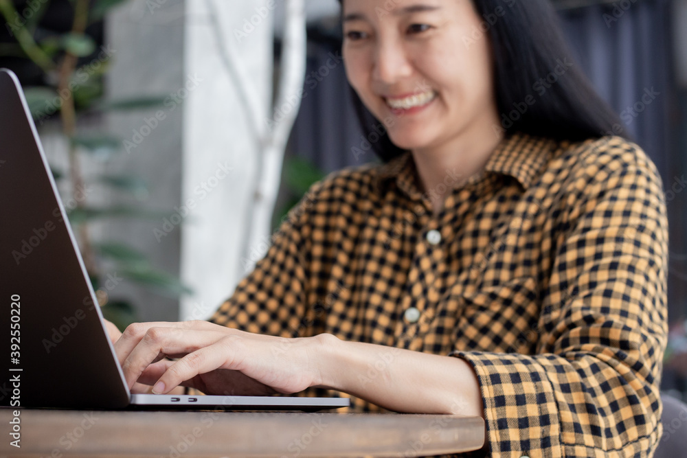 contact us.using computer.woman hand typing keyboard laptop work online chatting search form internet sitting at office.concept for technology device communication business people