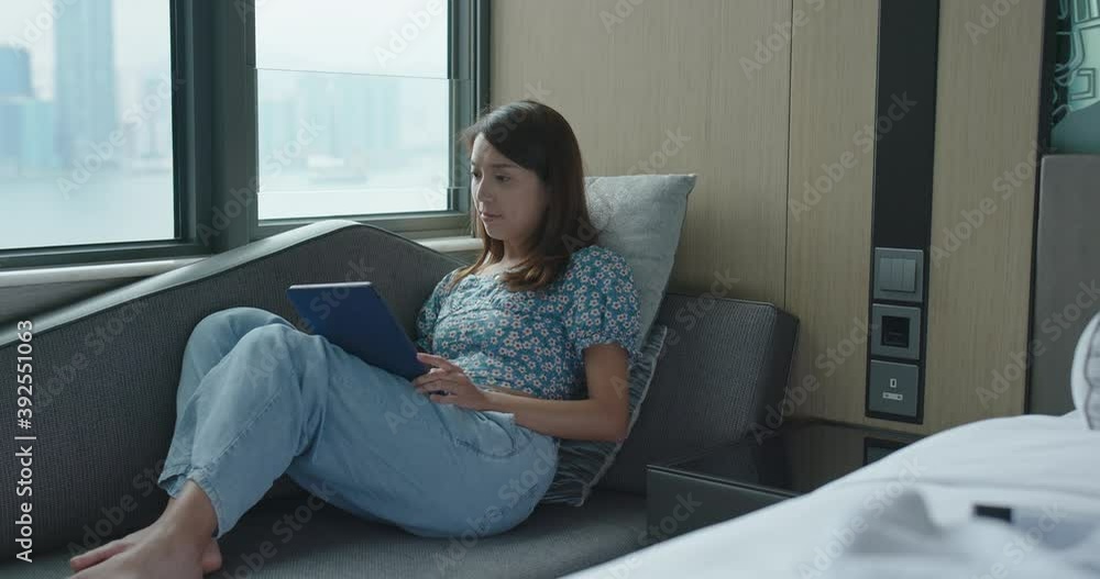 Woman use of tablet computer at room Woman use of tablet computer at room