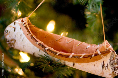 Birch bark canoe tree ornament.