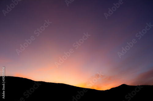 Sunset Behind Mountain Silhouette 