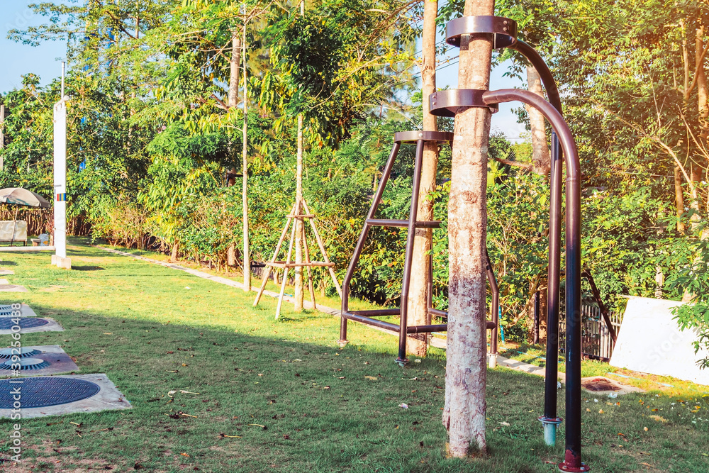 Black steel column supports and controls the branches and trunks of the tree to stand upright and beautiful in the park. Black steel column supports and controls the branches and trunks of the tree to stand upright and beautiful in the park.