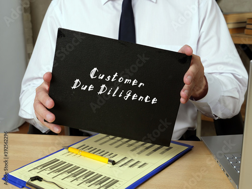 Photography Customer Due Diligence phrase on the page.