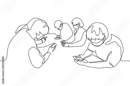 crowd of masked people are sitting staring at their gadgets. a group of people are sitting at the same table and are passionate about smartphones, they do not communicate with each other, they ignore