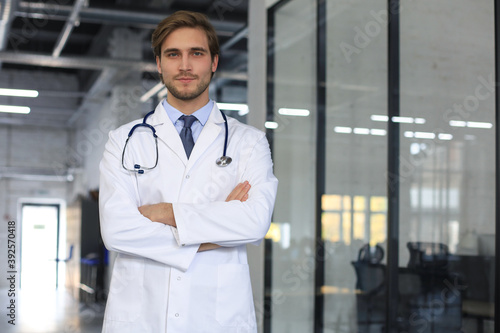 Portrait of young male doctor with stethoscope, close up