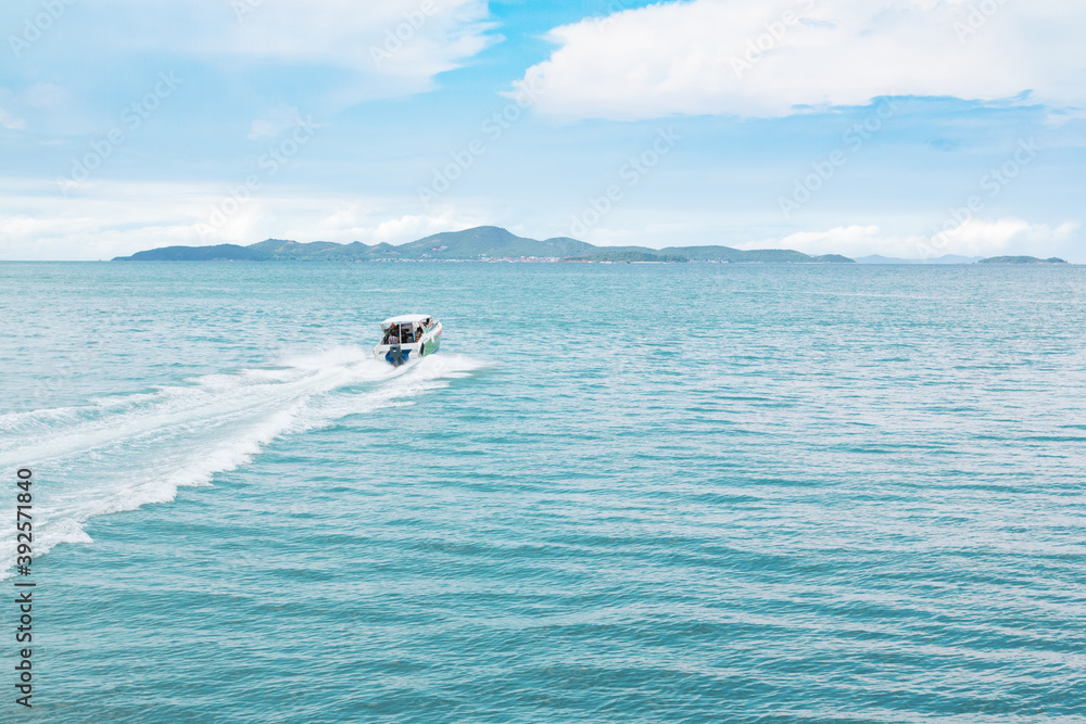 A speed boat sailed in the sea in the Gulf of Thailand heading for Koh Larn island. A speed boat sailed in the sea in the Gulf of Thailand heading for Koh Larn island.