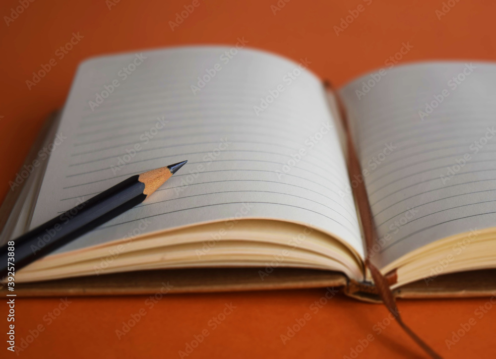 notebook and pencil