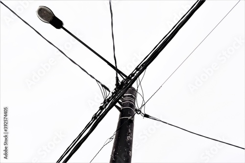 street lamp and electric wires on a pole