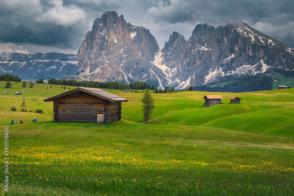 Seiser Alm resort with snowy mountains in background, Dolomites, Italy Seiser Alm resort with snowy mountains in background, Dolomites, Italy