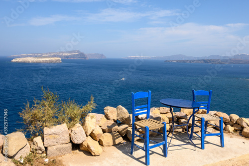 Table and chairs overlooking the sea in Santorini island. Cyclades  Greece