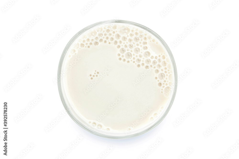 Glass of milk isolated on white background. From top view. Glass of milk isolated on white background. From top view.