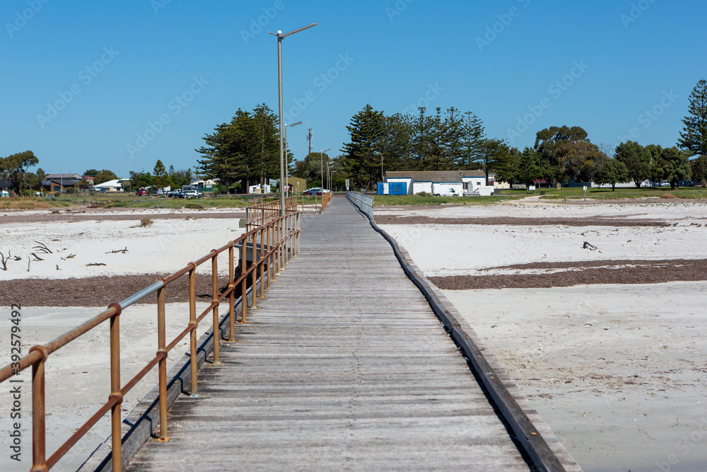 The kingston jetty located on the limstone coast looking back towards the town in south australia on November 8th 2020