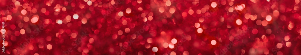 Abstract red color bokeh. Christmas background