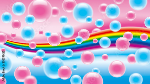 Pink and blue bubbles on a rainbow background. 