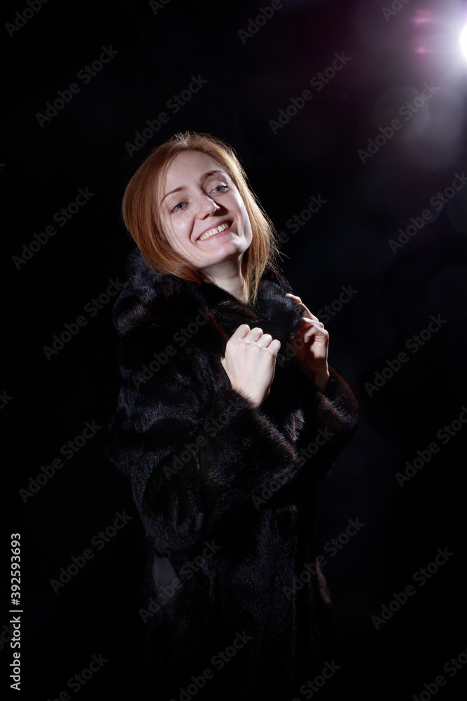 Pretty young woman dressed in fur coat Pretty young woman dressed in fur coat
