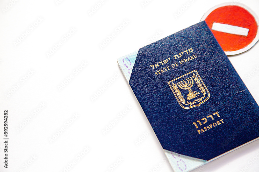 Israel's foreign passport cropped and ban sign Israel's foreign passport cropped and ban sign