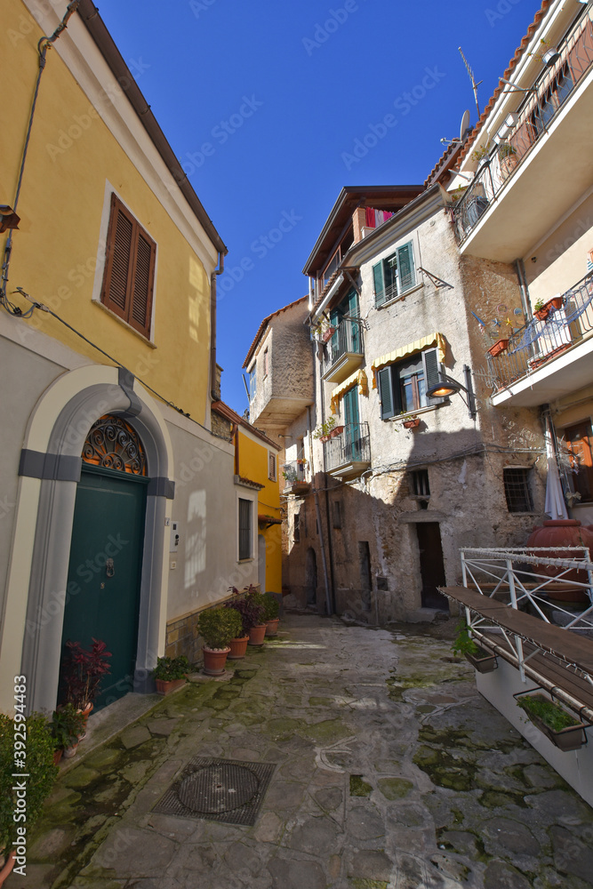 A narrow street among the old houses of Castellabate, a medieval village in the Campania region, Italy.
