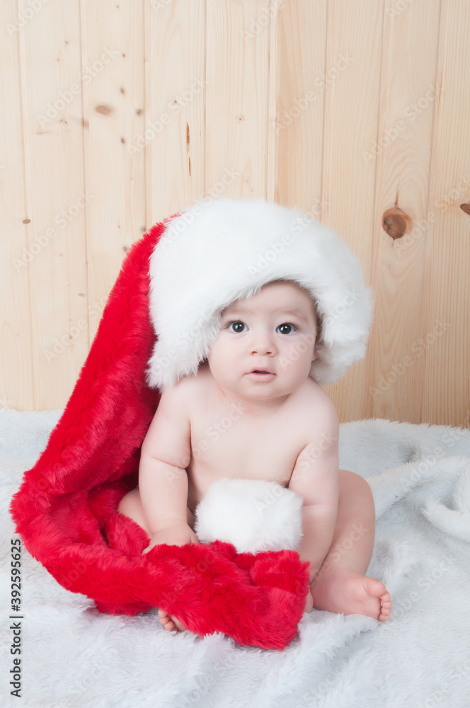 baby dressed as Santa Claus or Santa Claus for Christmas baby dressed as Santa Claus or Santa Claus for Christmas