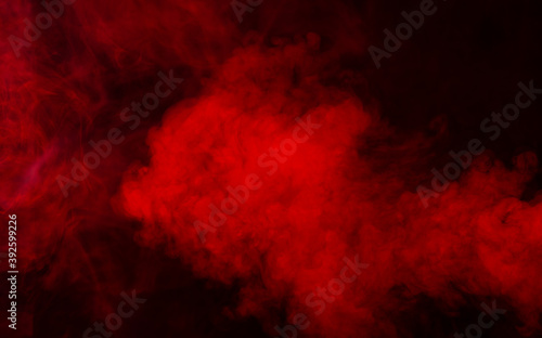 Red smoke on black background © olegkruglyak3