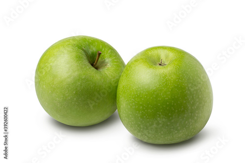 Two green apple fruits isolated on white background.