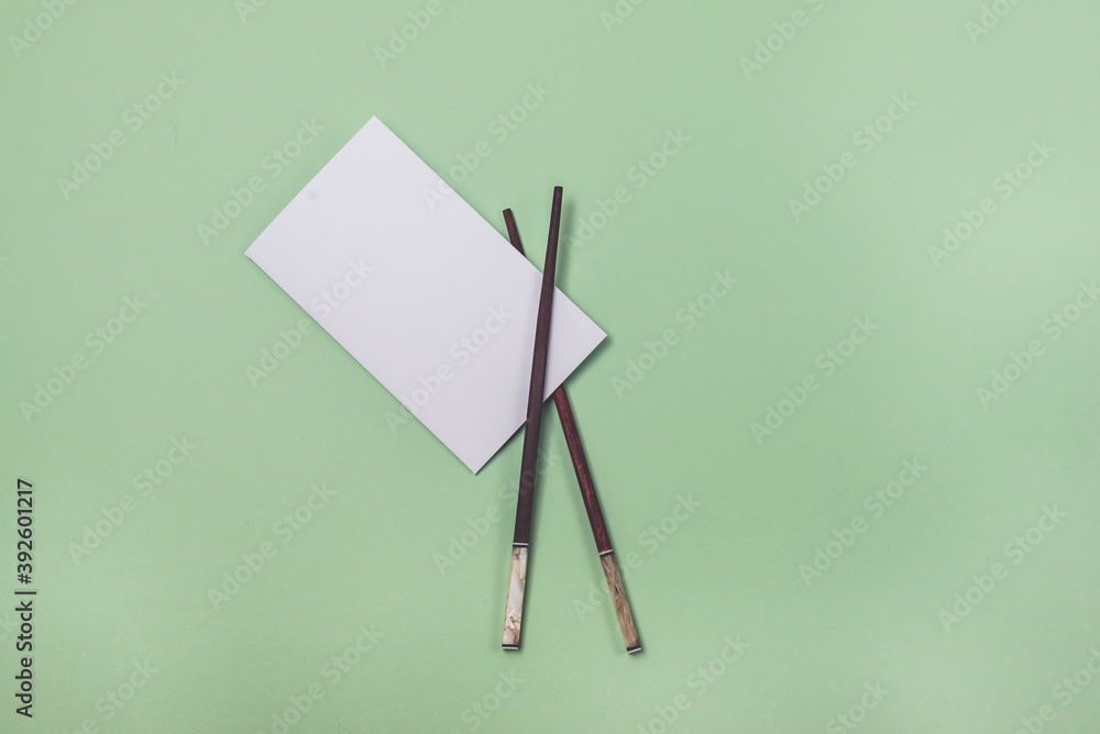 White Paper Brochure with Food Sticks on Light Green Background Mock up with White Paper Blank Horizontal White Paper Brochure with Food Sticks on Light Green Background Mock up with White Paper Blank Horizontal