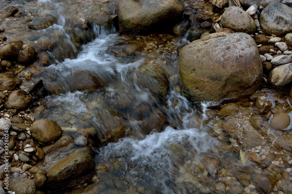 A small cascade of waterfalls on the river. A small cascade of waterfalls on the river.