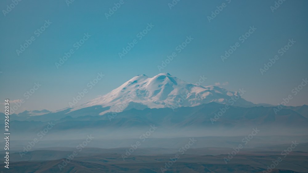 Photo of the largest mountain in Europe Elbrus from the side of the Bermamyt plateau