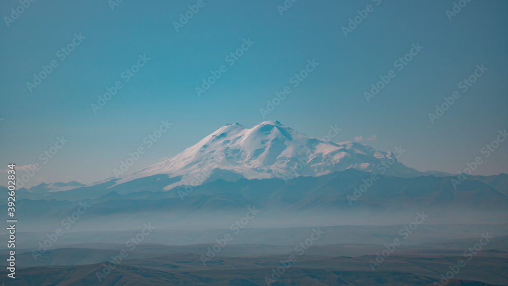 Photo of the largest mountain in Europe Elbrus from the side of the Bermamyt plateau Photo of the largest mountain in Europe Elbrus from the side of the Bermamyt plateau