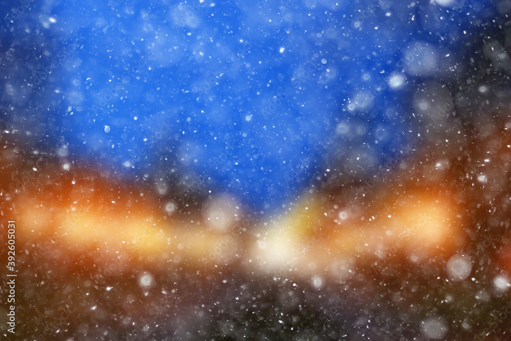 Fototapeta premium colorful background snow snowfall evening christmas lights, soft light blurry
