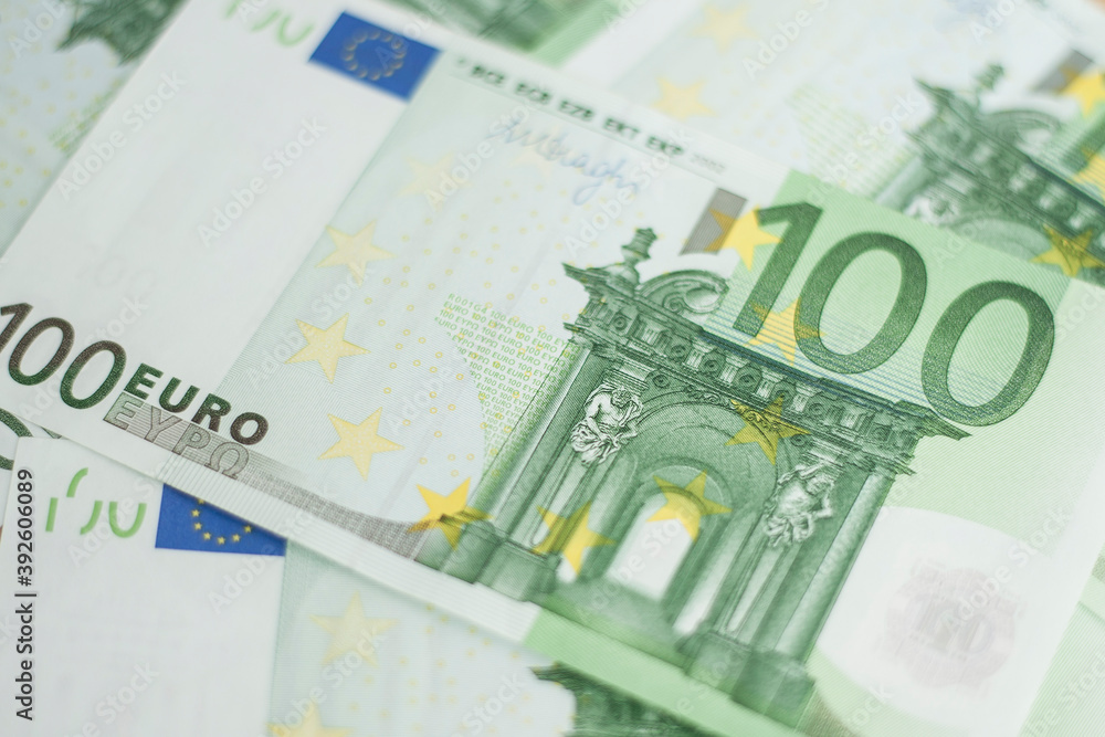100 euro bill. Europein money banknote. Hundred euro bills on wooden background.. 100 euro bill. Europein money banknote. Hundred euro bills on wooden background..