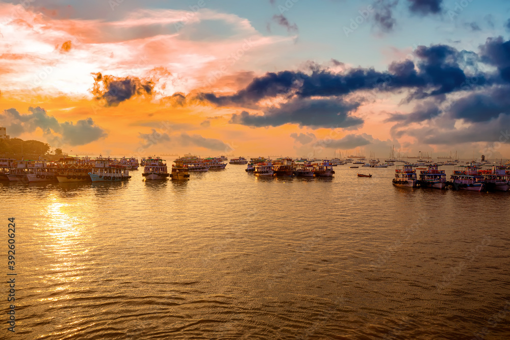 Boats on Mumbai water at dawn. Colaba region of Mumbai, Maharashtra, India.