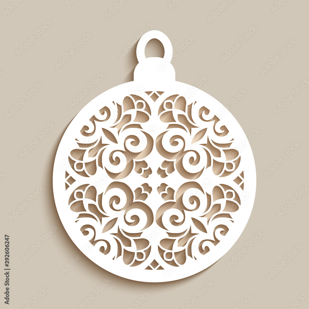 Fototapeta premium Christmas ornament with curly stencil pattern on neutral background, Xmas bauble with lace texture, cutout paper round decoration, template for cutting