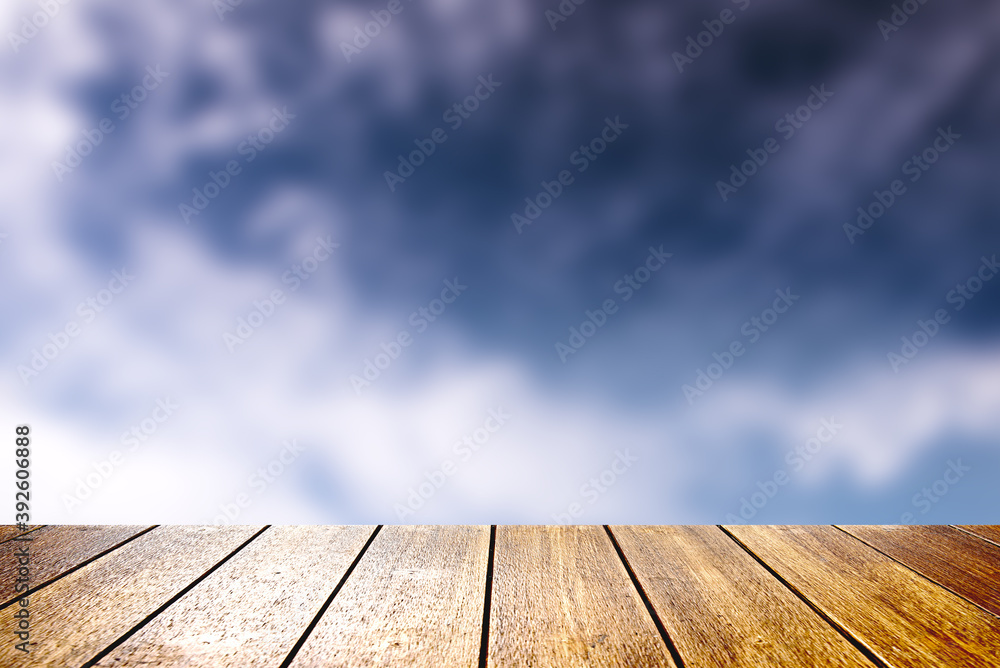Blue sky with plank floor