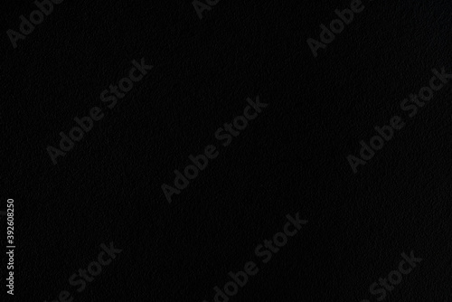 Black abstract background. White dots on a black background.