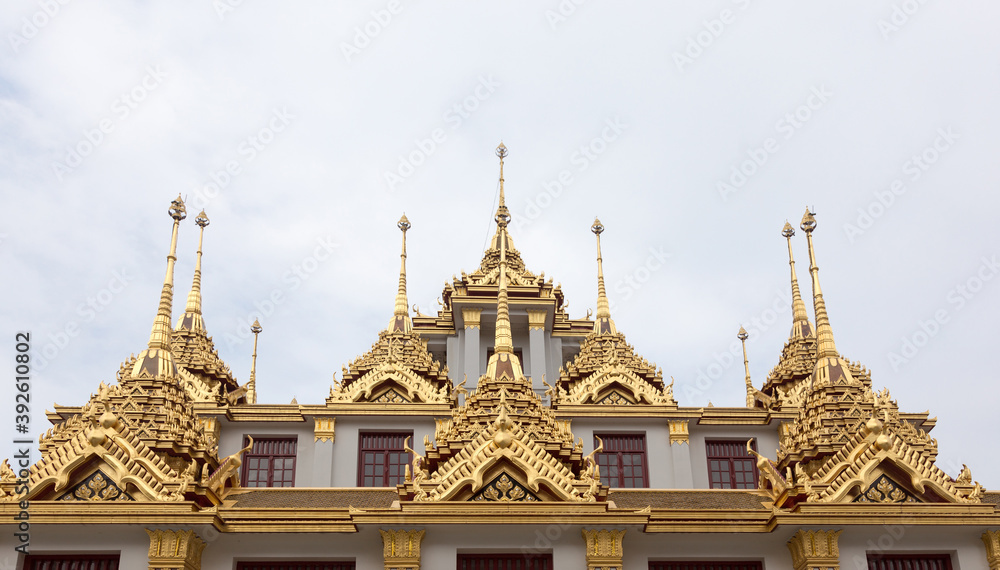Fototapeta premium buddhism temple architecture exterior with golden and antique