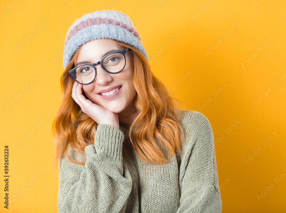 Closeup beautiful woman with smile expression, isolated on yellow background. Young joyous girl