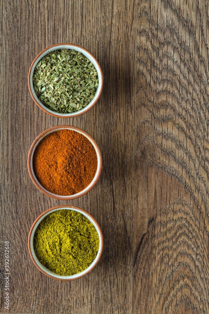 Magic of spice Khmeli-suneli, paprika, oregano and seasoning. Magic of spice Khmeli-suneli, paprika, oregano and seasoning.