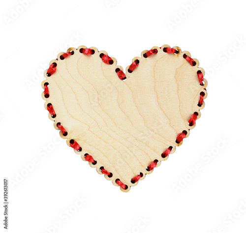Wooden heart with red ribbo...