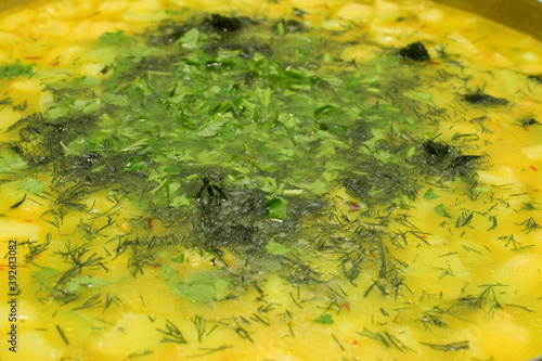 Baked rice with zucchini dill parsley and saffron meal close view